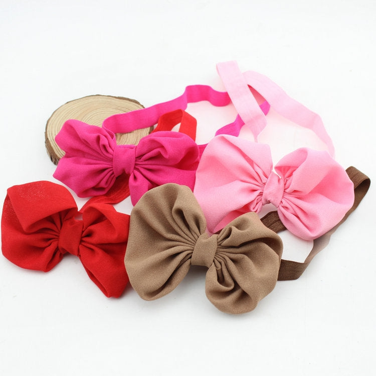 Assorted baby chiffon bow headbands with red, pink, and tan fabric bows