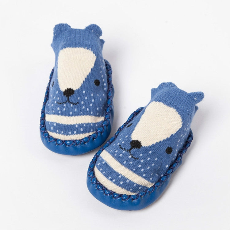 Blue knit toddler socks featuring cartoon bear face and stripes with non-slip grip sole