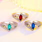 Set of three sterling silver rings with multicolor teardrop stones: red, green, blue