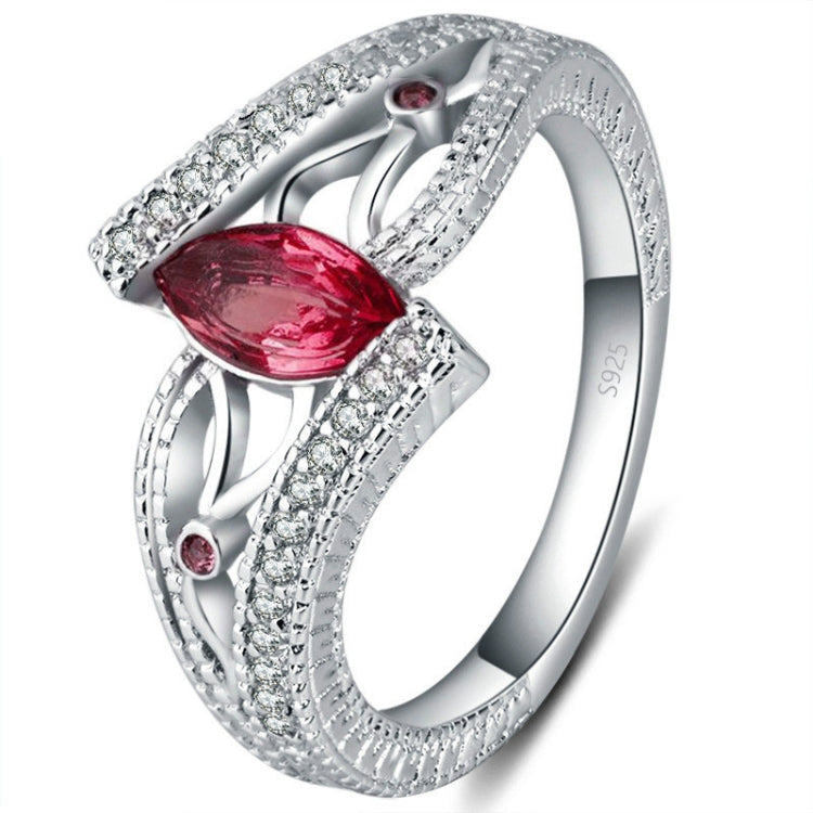 Sterling silver ring with marquise red zircon and pavé accents