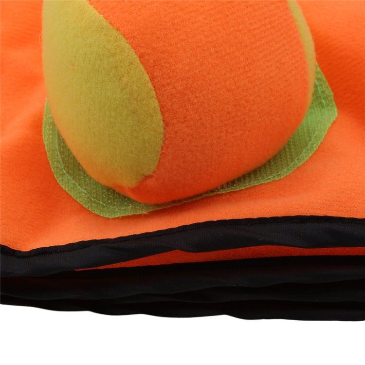 Orange plush glove showing green oval palm patch and black cuff trim.