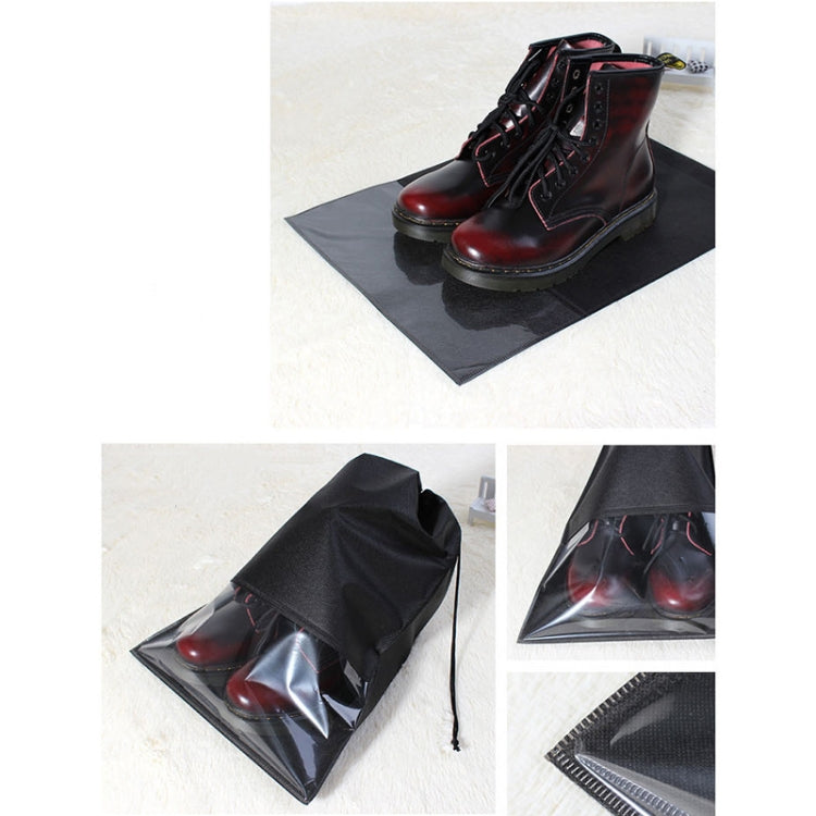Black drawstring shoe storage bag set with clear panels, holding red lace-up boots