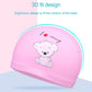 Pink children’s waterproof swim cap with cartoon bear face patch on front