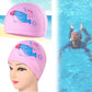 Pink waterproof swim cap with cartoon dolphin, shown worn on a head