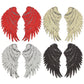 Assorted feather wing sequin patches in red, cream, white, silver, and black