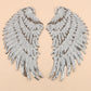 Pair of white sequin feather wing patches with layered scalloped fringe