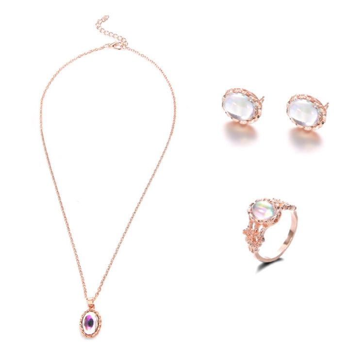 Rose-gold tone opal crystal pendant necklace with matching stud earrings and ring