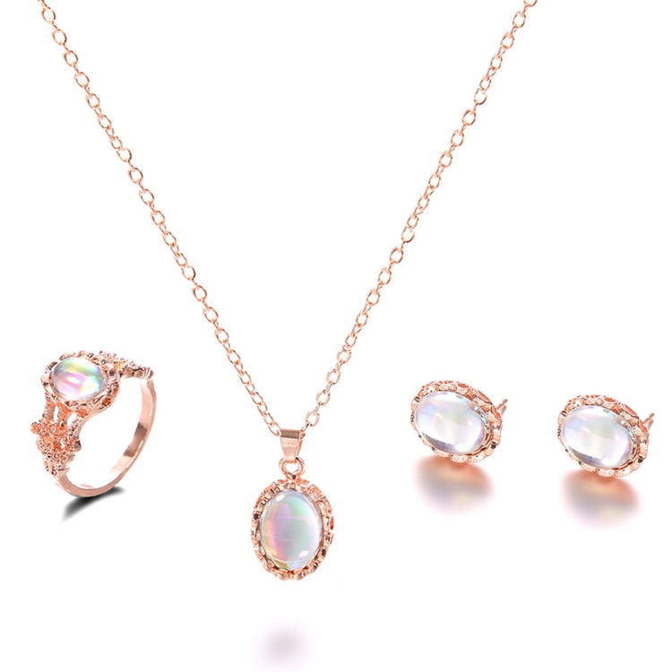 Rose-gold tone opal crystal pendant necklace with stud earrings and cocktail ring