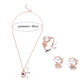 Rose-gold tone opal crystal pendant necklace with matching stud earrings and ring