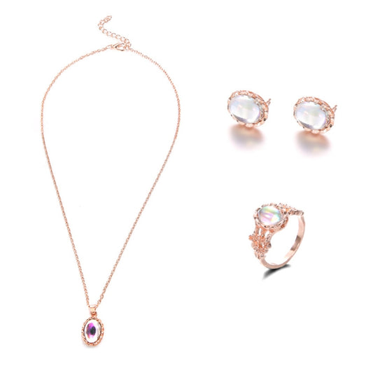 Rose-gold tone opal crystal pendant necklace with matching stud earrings and ring