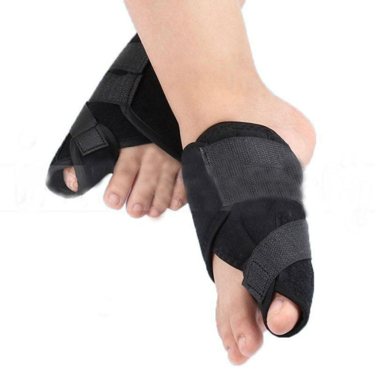Soft bunion toe separator brace on foot, black adjustable hook-and-loop straps and padding
