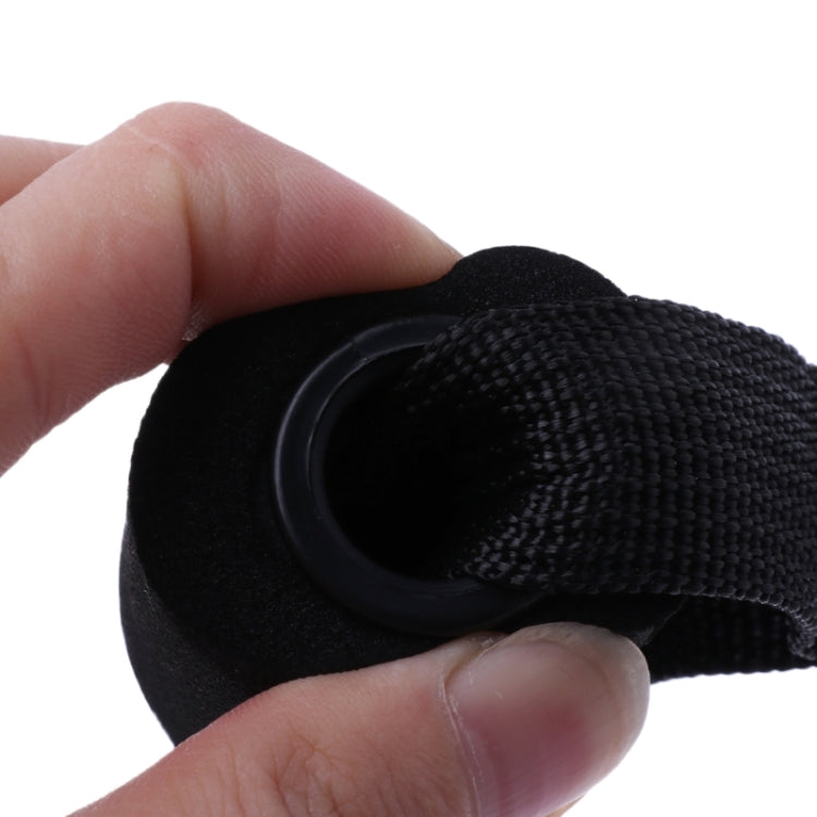 Black fabric door-buckle tension strap with rounded plastic ring detail