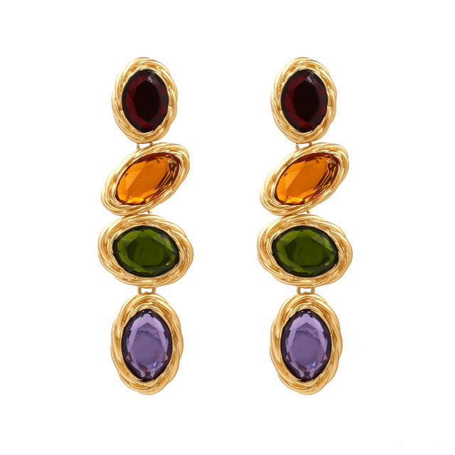 Gold-tone drop earrings with red, amber, green, and purple oval glass gems