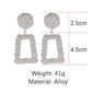 Silver-tone geometric trapezoid long dangle earrings with textured round tops