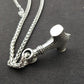 Engraved metal Viking hammer pendant on silver chain with braided links