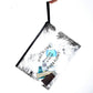Transparent PVC pouch with black zipper, tropical palm print, hanging wrist loop and toiletries inside