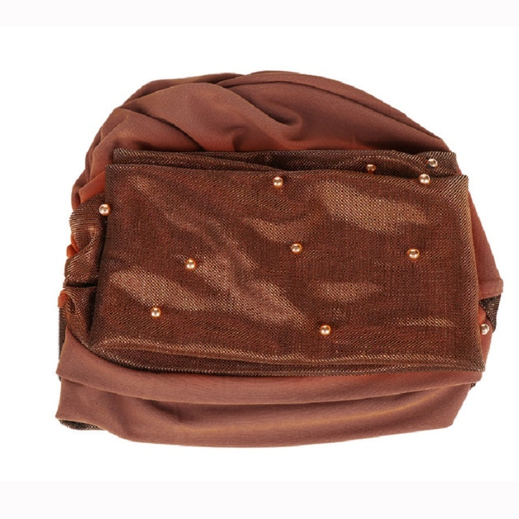 Brown beaded turban hat with textured fabric panels and small pearl embellishments