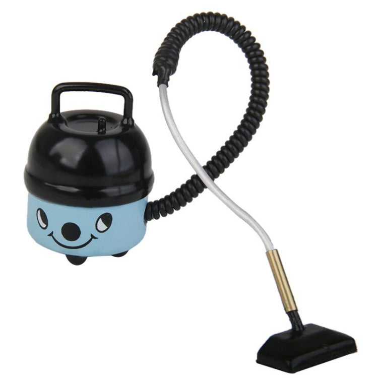 Blue mini vacuum toy with black canister, coiled hose, and flat rectangular brush head