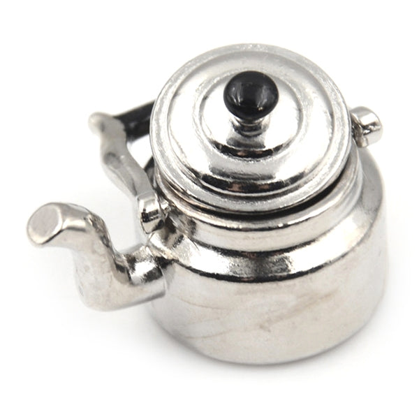 Miniature metal tea kettle with black knob lid, silver spout and side handle.