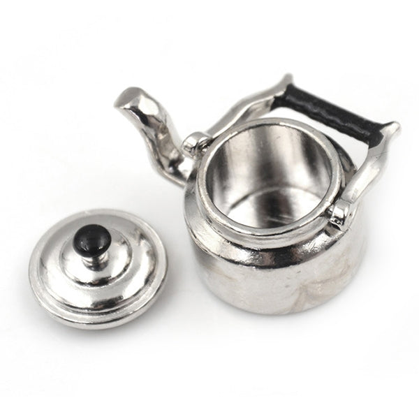 Miniature metal tea kettle with black knob lid and matching detached lid, silver finish.