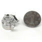 Miniature metal tea kettle with black knob lid, silver spout and small side handles.