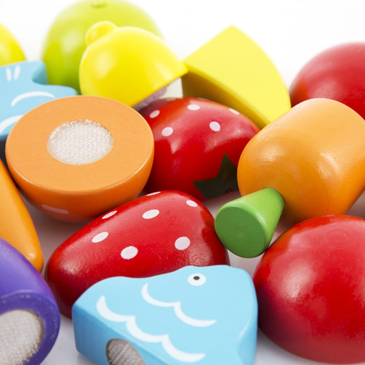 Close-up of colorful fruit and vegetable wooden cutting pieces