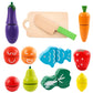 Fruit and vegetable cutting toy pieces with wooden board and green knife