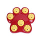 Red paw-shaped puzzle feeder bowl with five yellow smile inserts