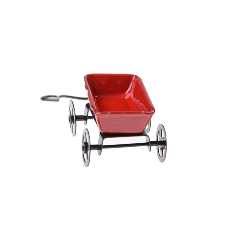 Mini red metal pulling cart with four wheels and compact frame