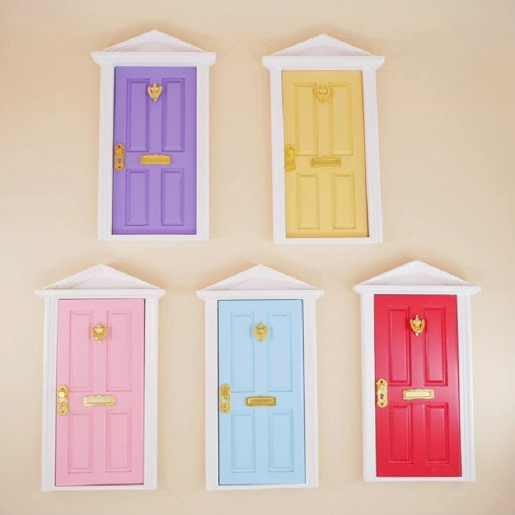 Miniature fairy tale door set with purple, sky blue, pink, and red doors, white frames