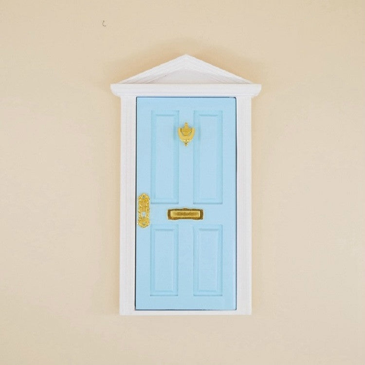 Miniature fairy tale door, sky blue with gold handle and latch, white frame
