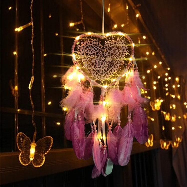 Pink heart dream catcher hanging decor with warm fairy lights and soft feather fringe
