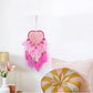 Pink heart dream catcher wall hanging with feather fringe and bead accents