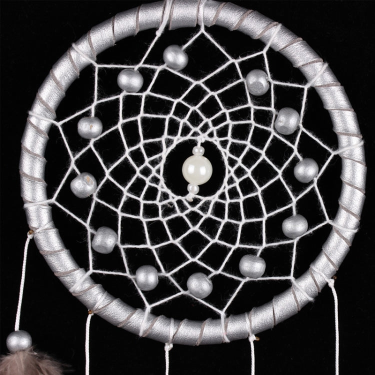 Round dreamcatcher web with silver mesh, bead ring, and dangling bead details