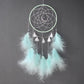Aqua/teal dream catcher wall hanging with circular web hoop and white feather fringe