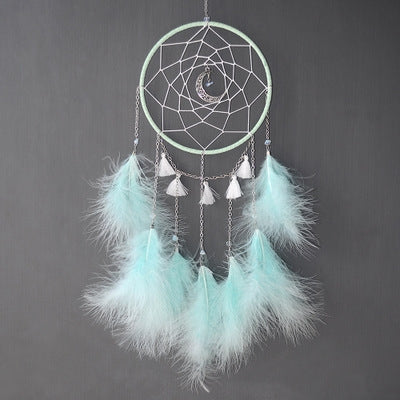 Aqua/teal dream catcher wall hanging with circular web hoop and white feather fringe