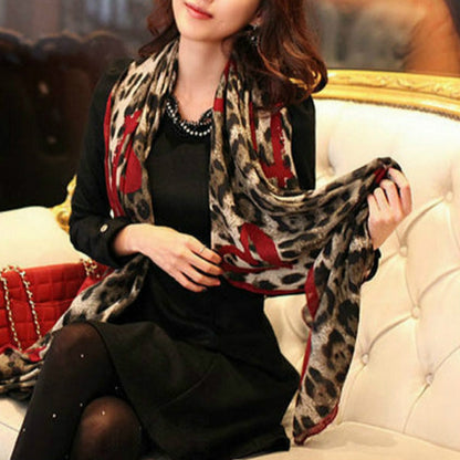 Leopard-print heart-pattern scarf shawl with red accents, draped on model