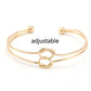 Gold-tone adjustable metal chain bracelet with double knot loop and ball ends