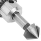 Close-up of a chamfering cutter bit with a faceted cutting head on a metal shank