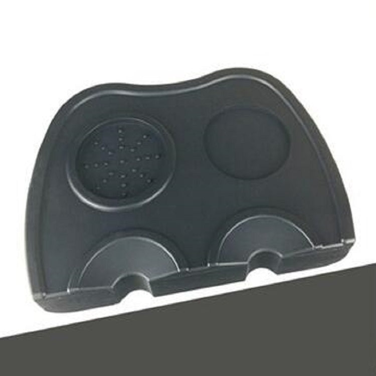Non-slip corner coffee pressure pad, dark gray/black with four raised sections