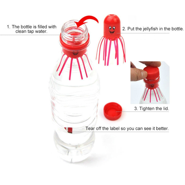 Red jellyfish toy with long tentacles beside a clear bottle setup.