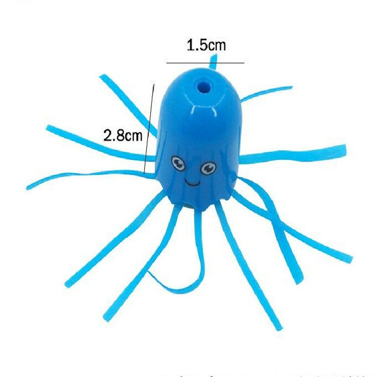 Blue jellyfish toy close-up with smiling face and tentacles, with size marks.