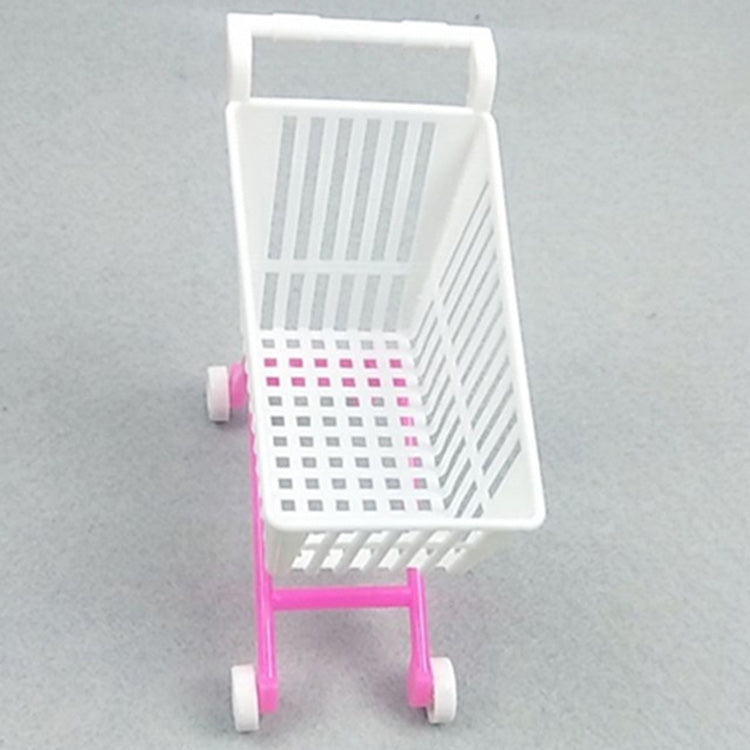 Doll shopping cart toy with white basket and pink frame, four small caster wheels