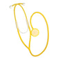 Yellow child role-play stethoscope toy with round chest diaphragm and curved tubing