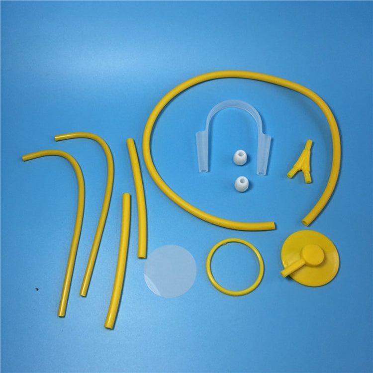 Yellow doctor play stethoscope kit pieces with tubing, diaphragm, and ear tips