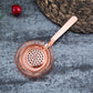Rose gold bartender ice strainer with spiral mesh and perforated filter disc, long handle
