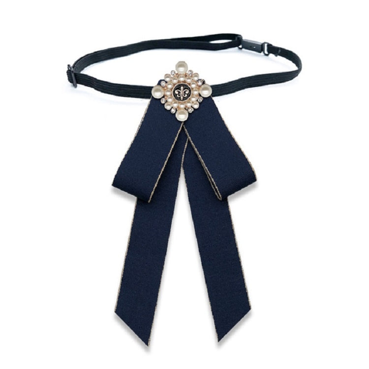 Navy cloth bow-knot tie with pearl flower center, long tails on black neck strap