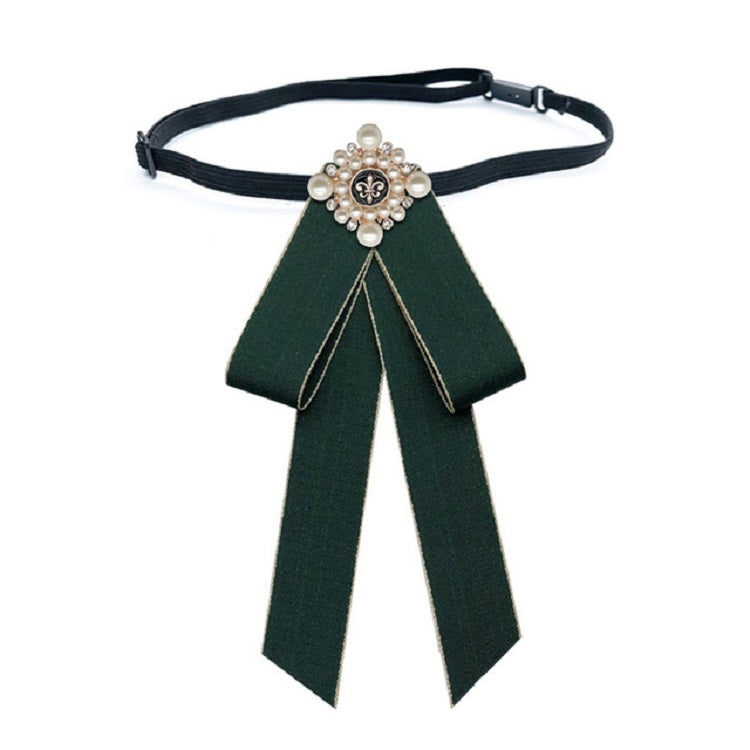 Dark green cloth bow-knot tie with pearl flower center, long tails on black neck strap
