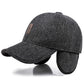 Dark gray warm baseball cap with curved brim and padded ear flaps, leather logo patch