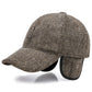 Brown textured baseball cap with curved brim and padded ear flaps, leather logo patch
